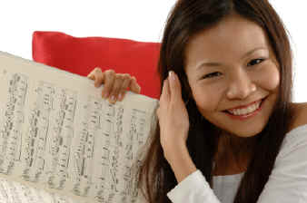 A musician practicing with sheet music